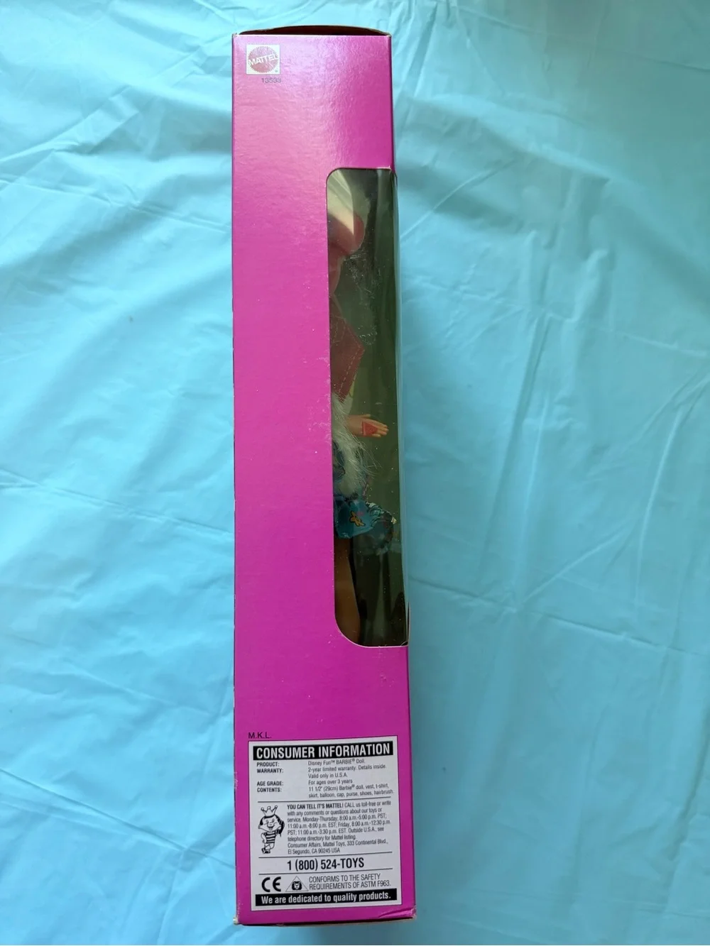 Mattel Barbie Doll with Blonde Hair, Pink, Blue, Yellow